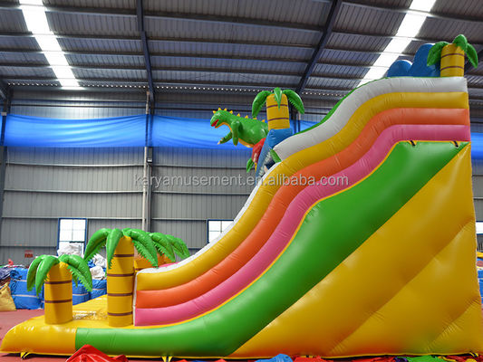 Parco all'aria aperta Gioco a 2 corsie Palma tropicale PVC gonfiabile Dinosauro Salto rimbalzo scivolo