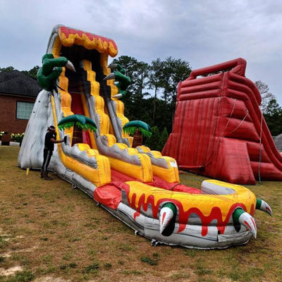 Grandi scivoli gonfiabili per adulti 36ft emozionante gioco di salto con tema dinosauro tropicale