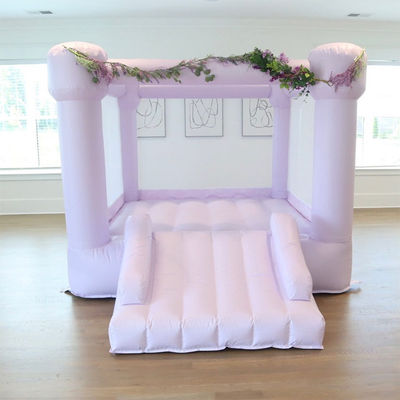 Bambini Trampolino rosa e castello gonfiabile Casa del buttafuori con rete bianca