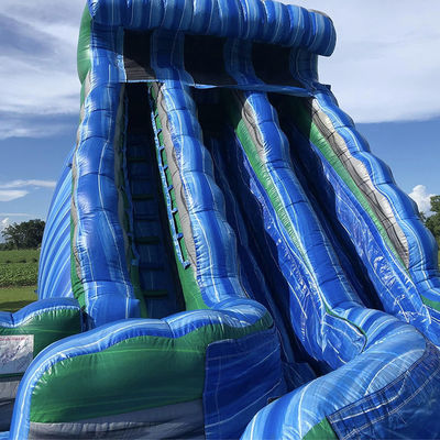 Parco acquatico all'aperto Grande scivolo gonfiabile a forma di onda con scivoli doppi in PVC blu