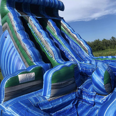 Parco acquatico all'aperto Grande scivolo gonfiabile a forma di onda con scivoli doppi in PVC blu
