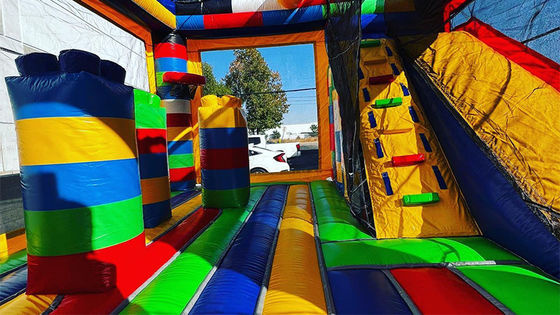 Intrattenimento all'interno e all'esterno Blocchi di costruzione in PVC Castello gonfiabile per feste